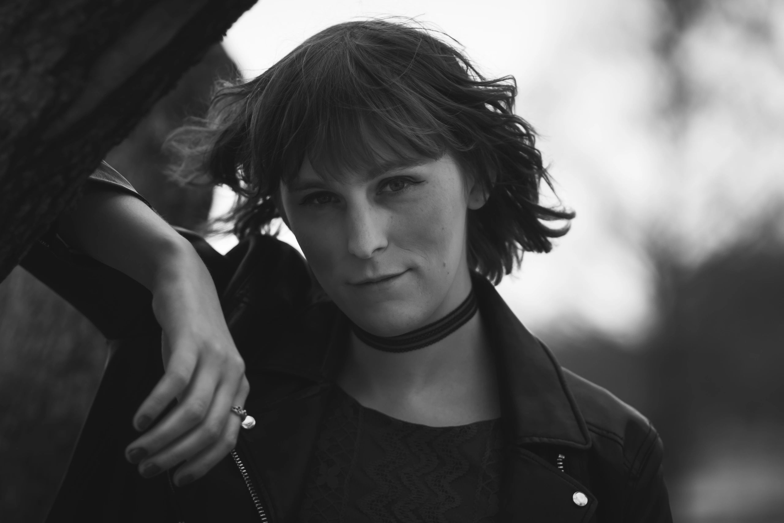 Portrait with dark hair and choker